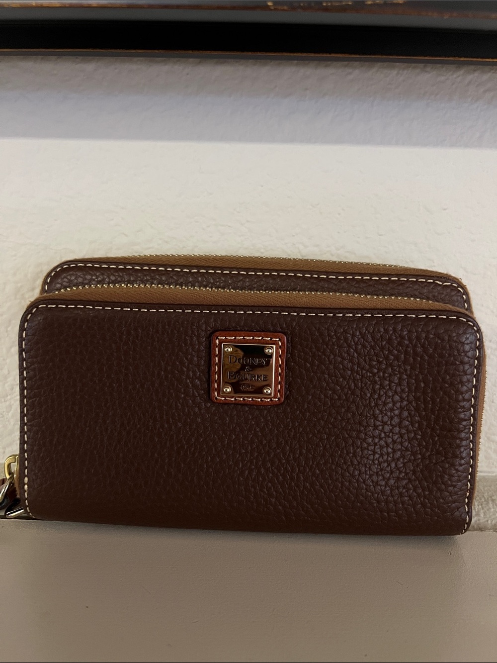 Dooney & Bourke Brown Pebbled Leather Zip Wallet with Gold Plaque